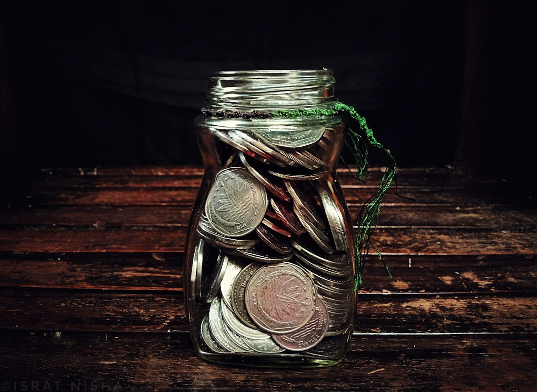 money growing in jar